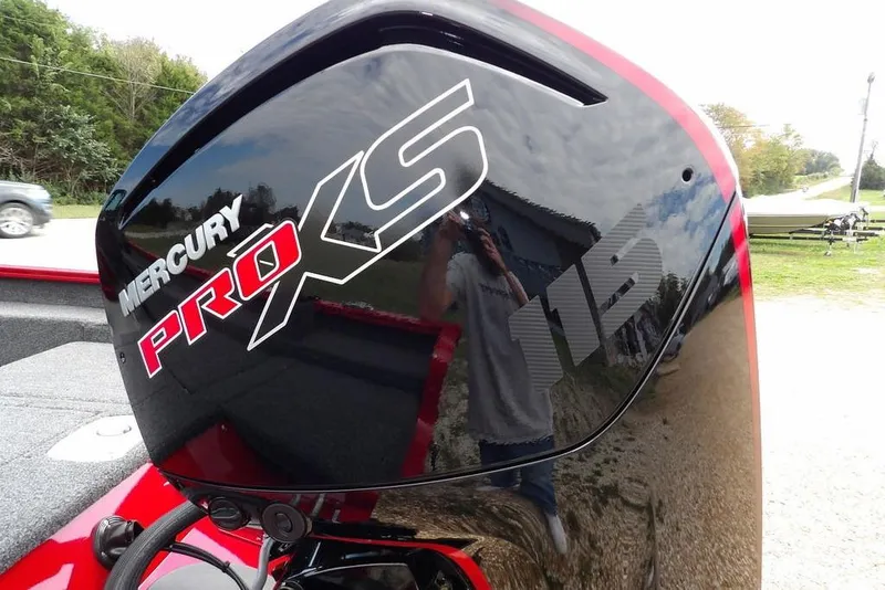 Slide: The Image of Mercury Pro XS 115 engine on 2026 Lund 1775 Adventure Sport boat, outdoor setting. - 56