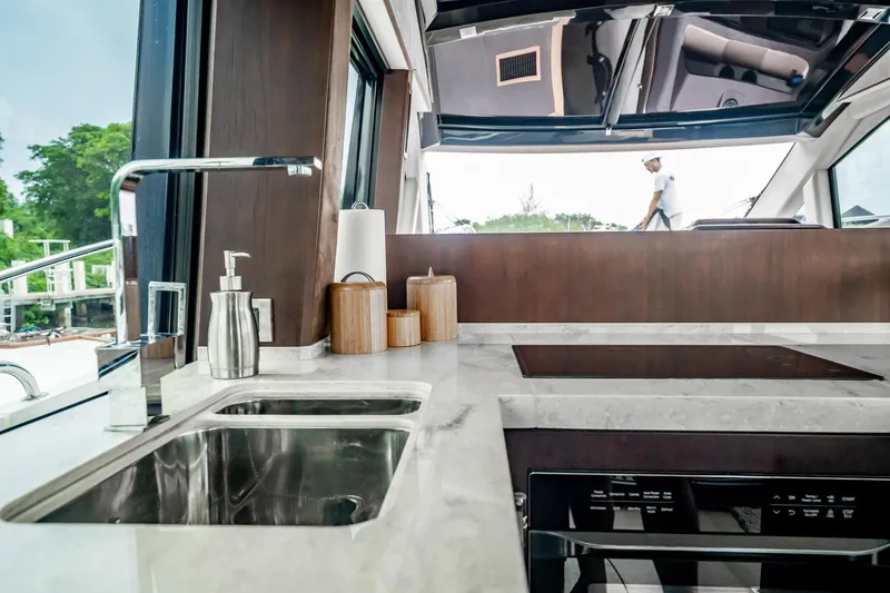 Slide: The Image of Modern kitchen interior of 2017 Galeon 510 Sky yacht with sleek design and appliances. - 13