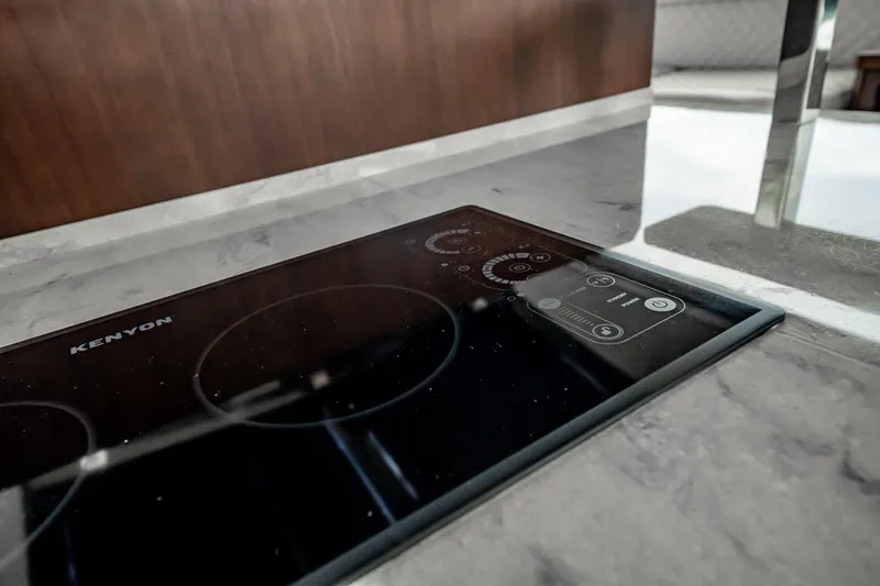 Slide: The Image of Modern Kenyon cooktop on Galeon 510 Sky yacht's sleek kitchen counter, 2017 model. - 14