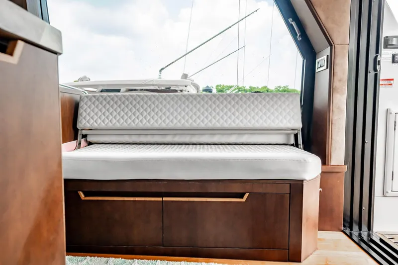 Slide: The Image of Luxurious interior seating on 2017 Galeon 510 Sky yacht with quilted upholstery. - 16