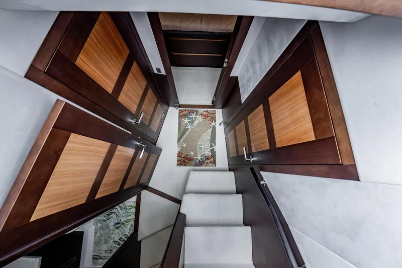 Slide: The Image of Interior of 2017 Galeon 510 Sky yacht with wooden doors and carpeted stairs. - 24