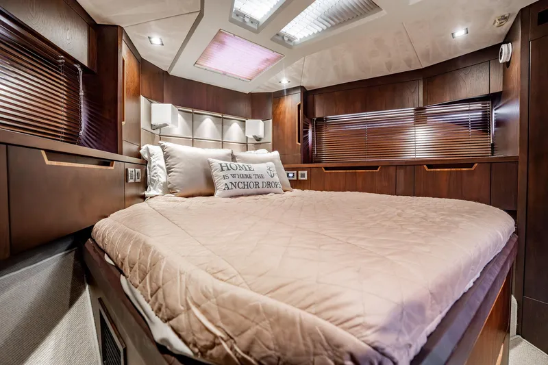 Slide: The Image of Luxurious bedroom interior of 2017 Galeon 510 Sky yacht with elegant wood finishes. - 25