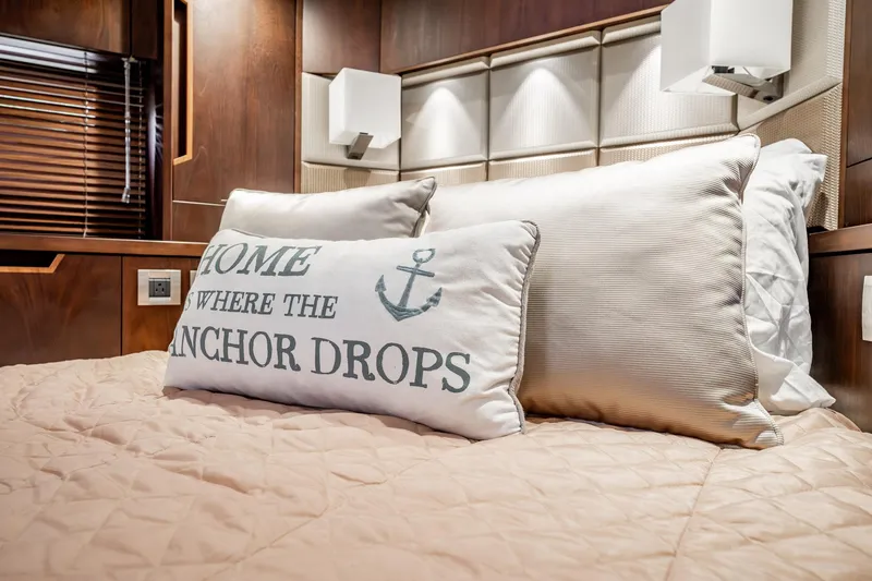 Slide: The Image of Luxurious bedroom interior of 2017 Galeon 510 Sky yacht with nautical-themed pillow. - 27