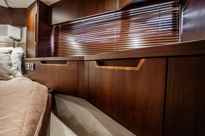 Slide: The Image of Luxurious interior of 2017 Galeon 510 Sky yacht with wooden cabinetry and blinds. - 28