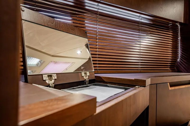 Slide: The Image of Luxurious interior of 2017 Galeon 510 Sky yacht with wooden blinds and mirror. - 29