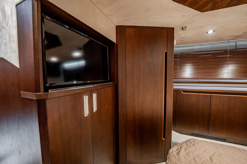 Slide: The Image of Luxurious interior of 2017 Galeon 510 Sky yacht with TV and wooden cabinetry. - 37