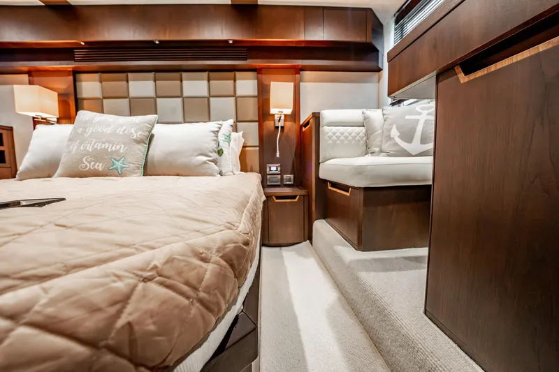 Slide: The Image of Luxurious interior of 2017 Galeon 510 Sky yacht with cozy bedding and elegant wood finishes. - 41