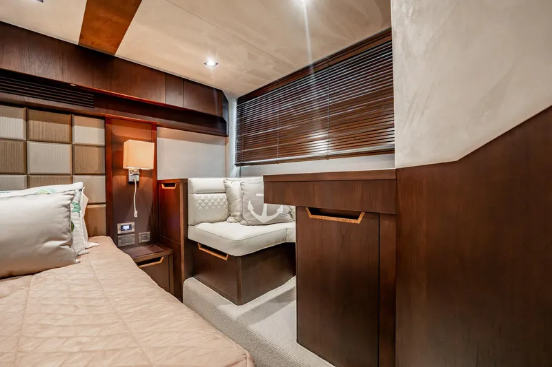 Slide: The Image of Luxurious interior of 2017 Galeon 510 Sky yacht with elegant wood finishes and cozy seating. - 45