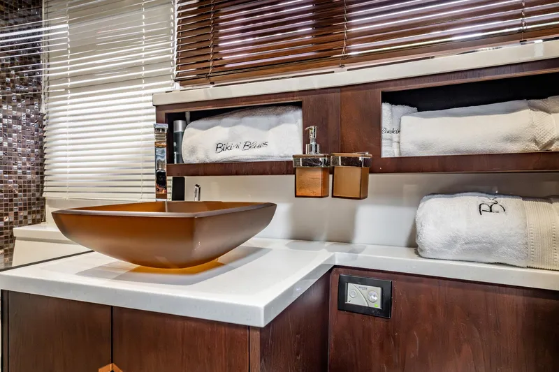 Slide: The Image of Luxurious bathroom on 2017 Galeon 510 Sky yacht with modern sink and plush towels. - 48