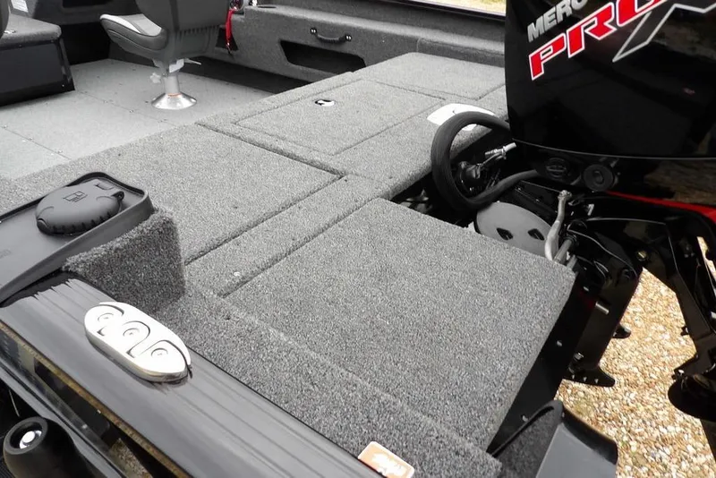 Slide: The Image of 2026 Lund 1775 Adventure SS boat interior with Mercury Pro outboard motor. - 10