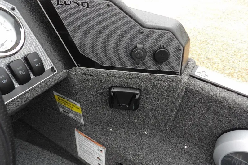 Slide: The Image of Interior view of 2026 Lund 1775 Adventure SS boat dashboard and controls. - 23