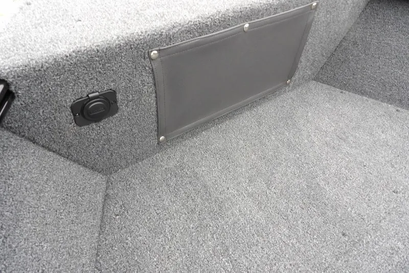 Slide: The Image of Interior of 2026 Lund 1775 Adventure SS boat with carpeted storage area. - 31