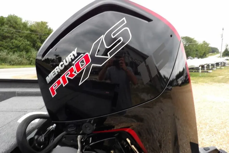 Slide: The Image of 2026 Lund 1775 Adventure SS with Mercury Pro XS outboard motor, outdoors setting. - 46