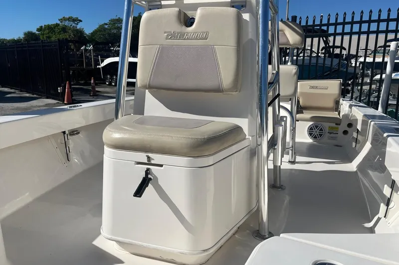 Slide: The Image of Pathfinder 2005 TRS boat interior, featuring cushioned seating and storage, 2022 model. - 8