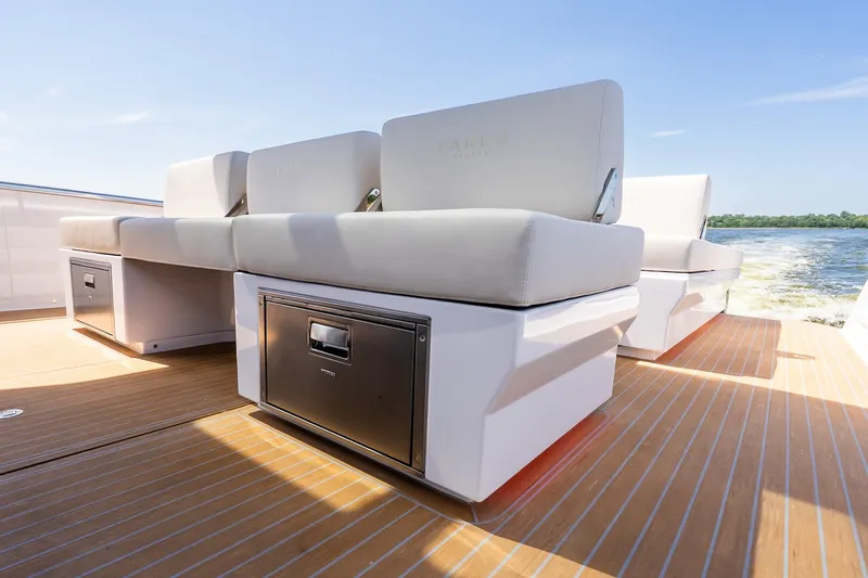 Slide: The Image of Luxury seating on 2027 Pardo Yachts P43R, featuring sleek design and ocean backdrop. - 16