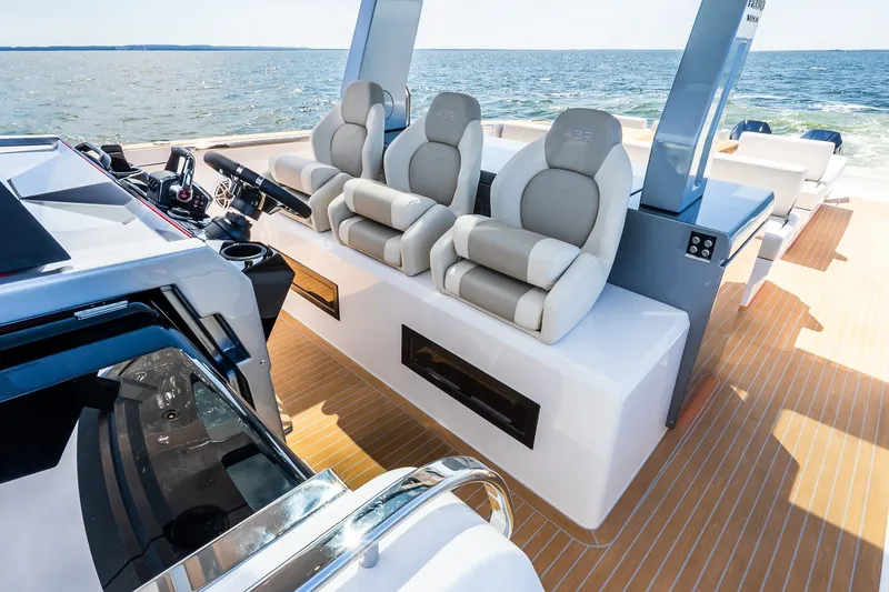 Slide: The Image of Luxurious 2027 Pardo Yachts P43R interior with plush seating and sleek design on open water. - 49