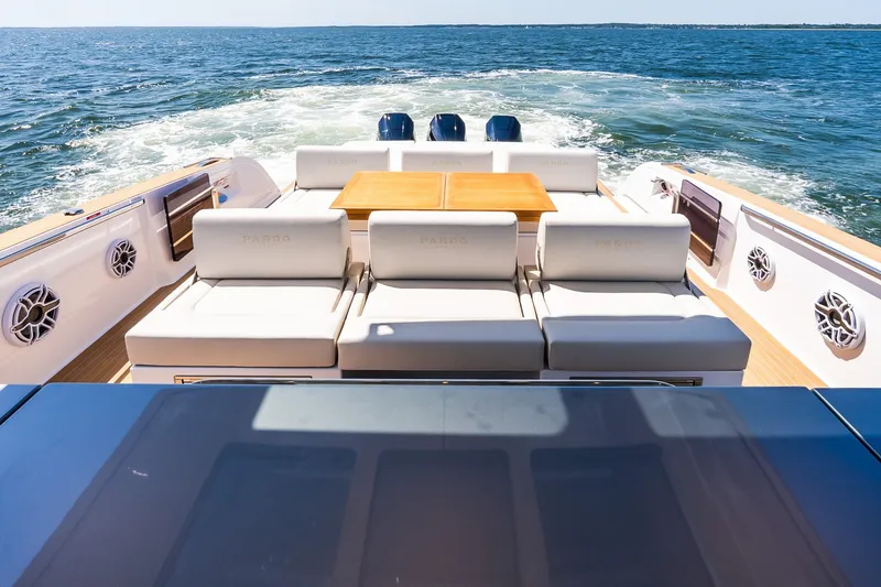 Slide: The Image of Luxurious 2027 Pardo Yachts P43R with elegant seating and ocean view. - 13