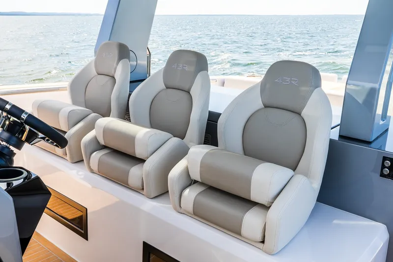 Slide: The Image of Luxury seating on 2027 Pardo Yachts P43R, overlooking serene ocean view. - 50