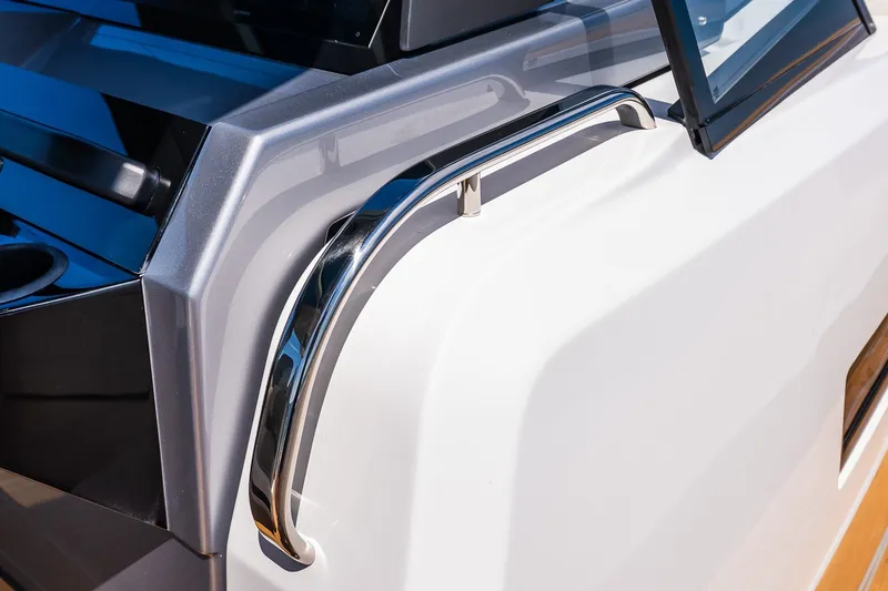 Slide: The Image of Close-up of 2027 Pardo Yachts P43R, showcasing sleek chrome detailing and modern design. - 56