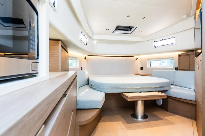 Slide: The Image of Luxurious interior of 2027 Pardo Yachts P43R with modern furnishings and ample natural light. - 19