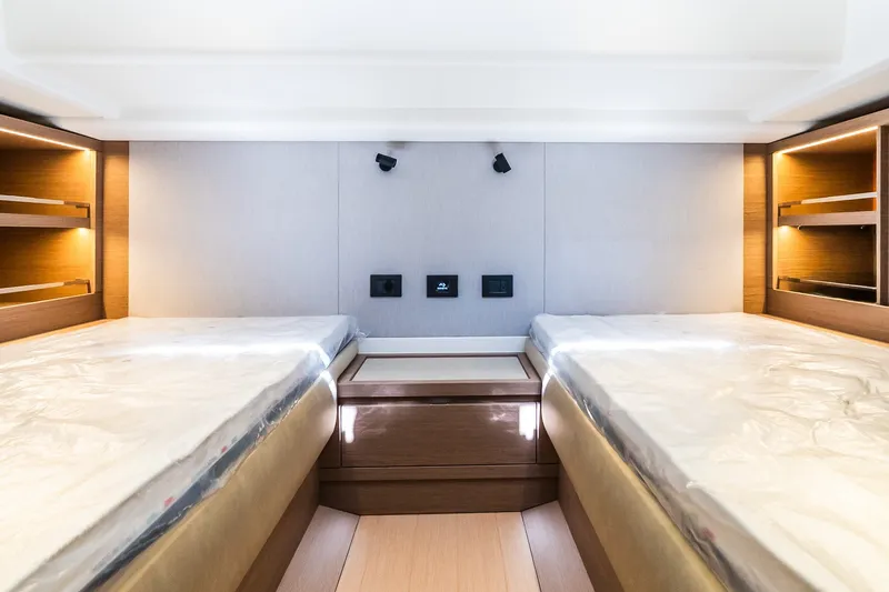 Slide: The Image of Interior cabin of 2027 Pardo Yachts P43R with twin beds and modern lighting. - 28
