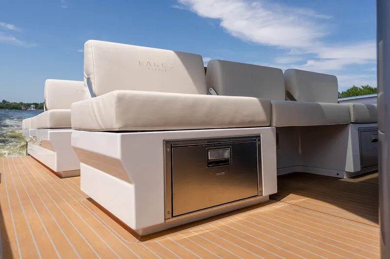 Slide: The Image of Luxury seating on 2027 Pardo Yachts P43R, featuring sleek design and storage. - 38