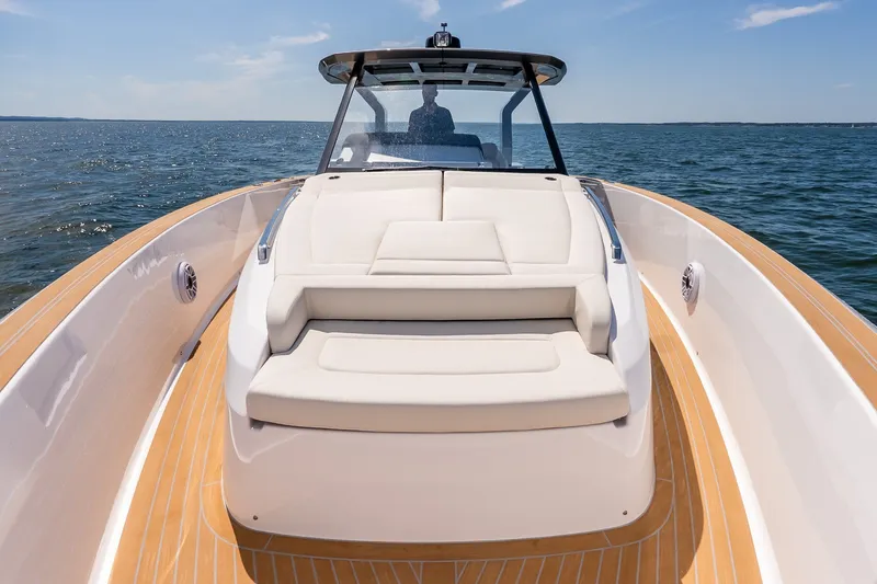 Slide: The Image of 2027 Pardo Yachts P43R luxury yacht on open water, featuring sleek design and spacious deck. - 46