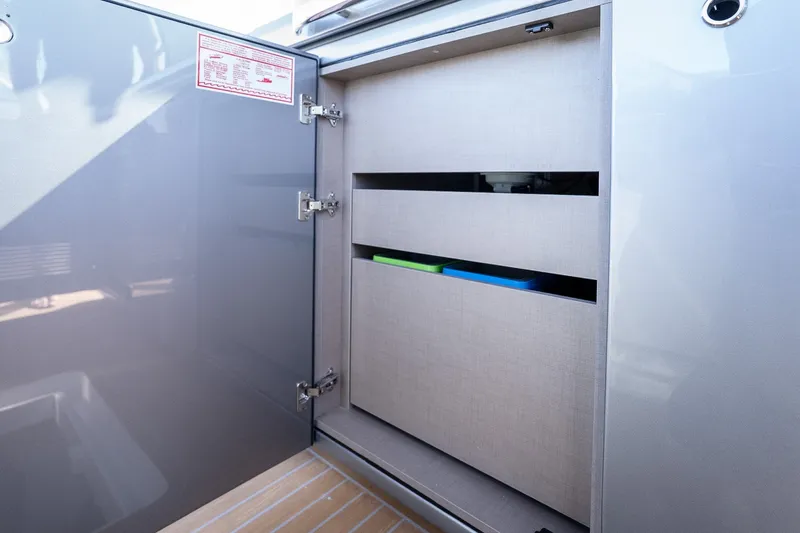 Slide: The Image of Open storage cabinet on 2027 Pardo Yachts P43R, showcasing sleek interior design. - 62