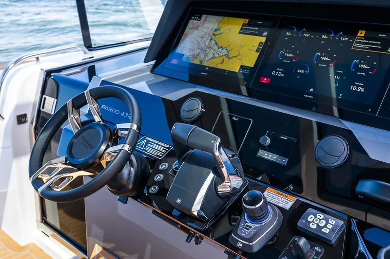 Slide: The Image of 2027 Pardo Yachts P43R helm with advanced navigation and control systems. - 54
