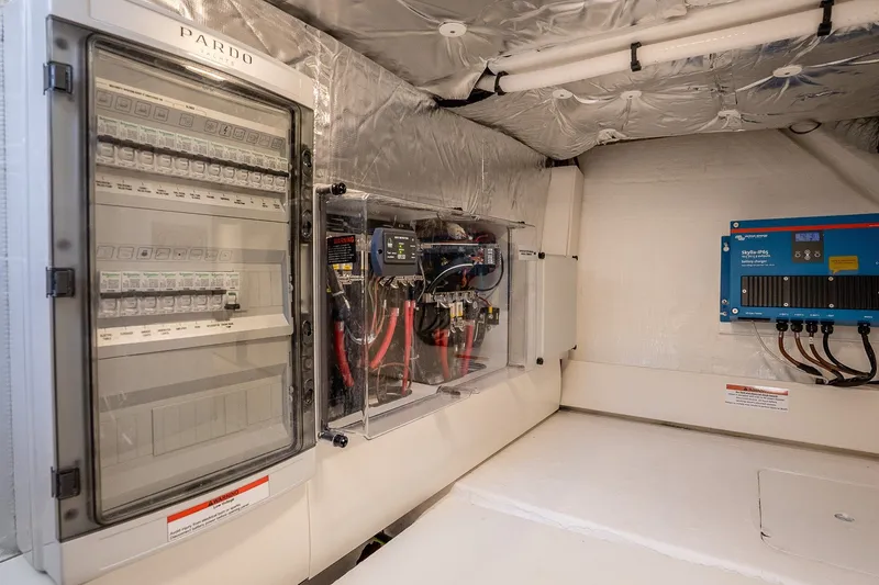 Slide: The Image of Electrical control room of 2027 Pardo Yachts P43R, featuring advanced systems and wiring. - 60