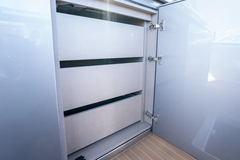 Slide: The Image of Interior storage cabinet on 2027 Pardo Yachts P43R, featuring sleek design and modern hinges. - 63