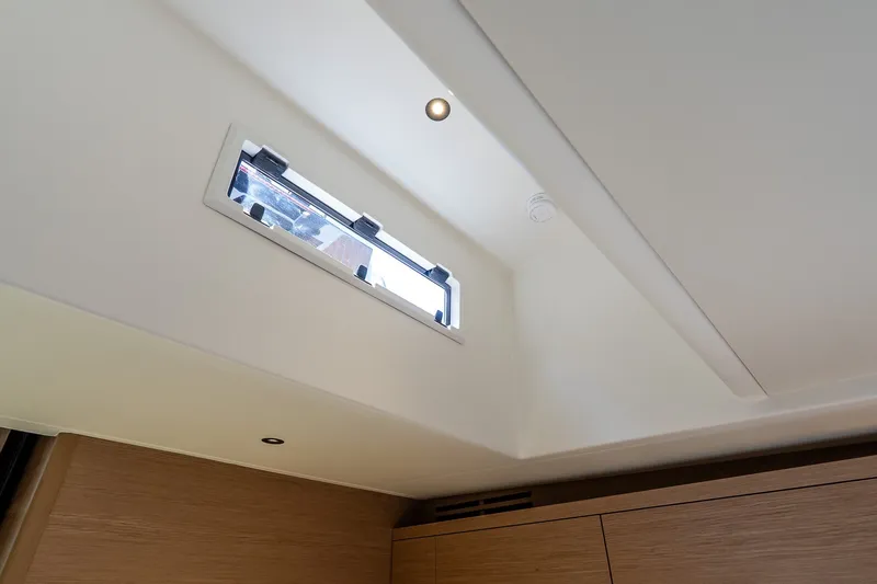 Slide: The Image of Ceiling view of 2027 Pardo Yachts P43R interior with skylight and recessed lighting. - 32