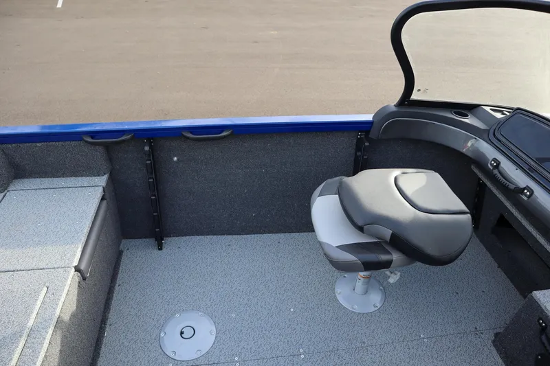 Slide: The Image of 2026 Crestliner 1750 Hawk boat interior with seating and console. - 9