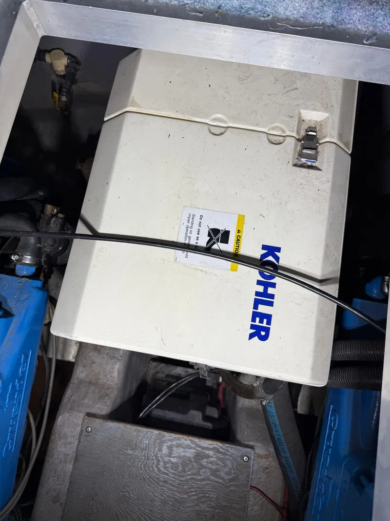 Slide: The Image of 1994 Carver 390 engine compartment with Kohler generator. - 6