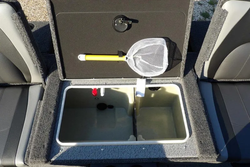 Slide: The Image of 2026 Lund 1775 Impact XS Sport boat livewell with net and storage compartment. - 24