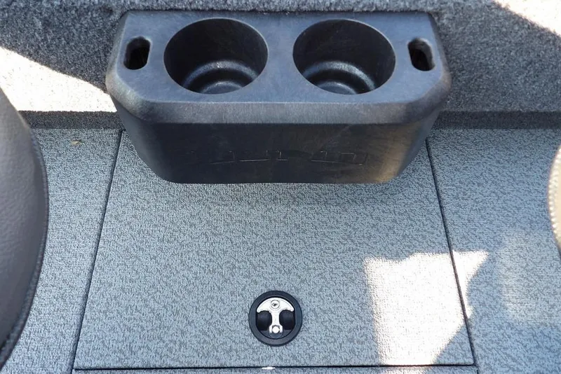 Slide: The Image of 2026 Lund 1775 Impact XS Sport boat interior with dual cup holders. - 26