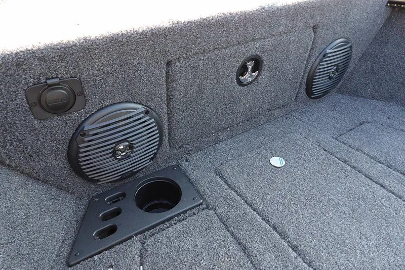 Slide: The Image of Interior of 2026 Lund 1775 Impact XS Sport boat with speakers and cup holder. - 57