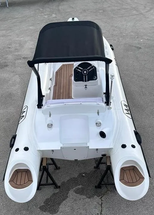 Slide: The Image of 2024 Aqvaboats LUXRIB 14 inflatable boat with canopy and wooden deck. - 12