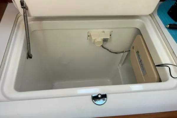 Slide: The Image of Open storage compartment in 2003 Beneteau 331 sailboat interior. - 16