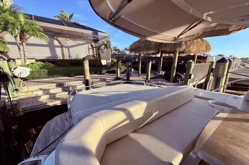 Slide: The Image of Luxury 2016 Cranchi M 44 HT yacht docked near tropical waterfront. - 26