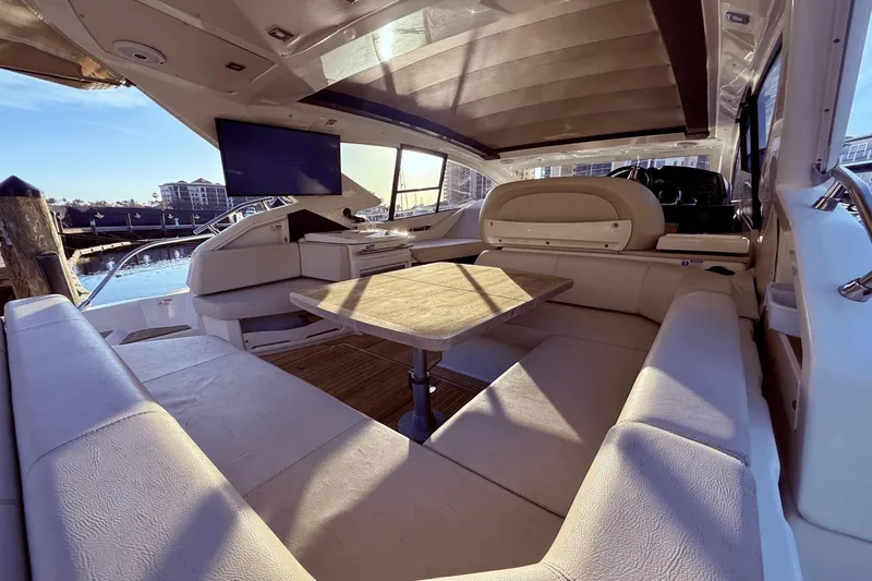 Slide: The Image of Luxurious interior of 2016 Cranchi M 44 HT yacht with seating and table. - 27