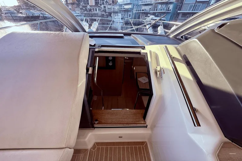 Slide: The Image of 2016 Cranchi M 44 HT yacht interior entrance with marina view. - 34