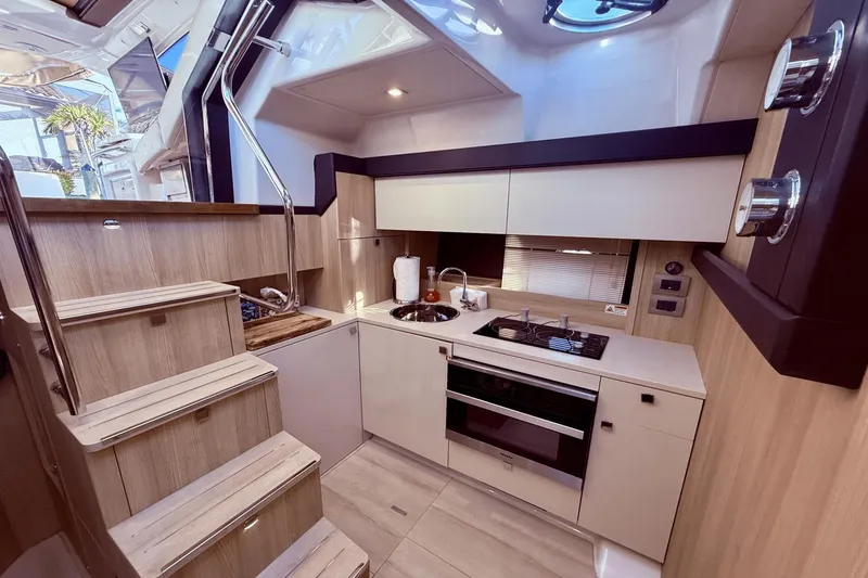 Slide: The Image of Modern kitchen interior of 2016 Cranchi M 44 HT yacht with sleek design and appliances. - 36