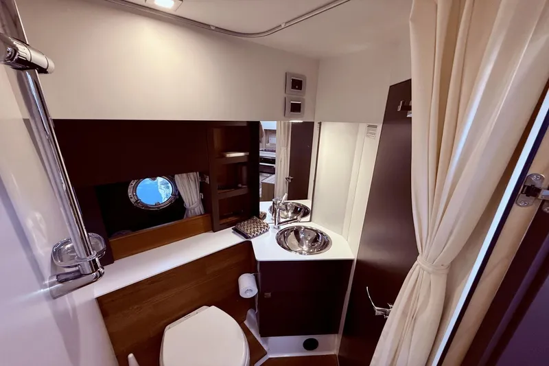 Slide: The Image of Luxurious bathroom interior of 2016 Cranchi M 44 HT yacht with modern fixtures. - 45