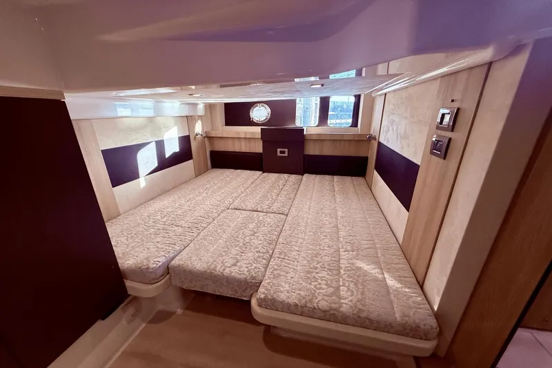 Slide: The Image of Luxurious interior cabin of 2016 Cranchi M 44 HT yacht with elegant bedding. - 47