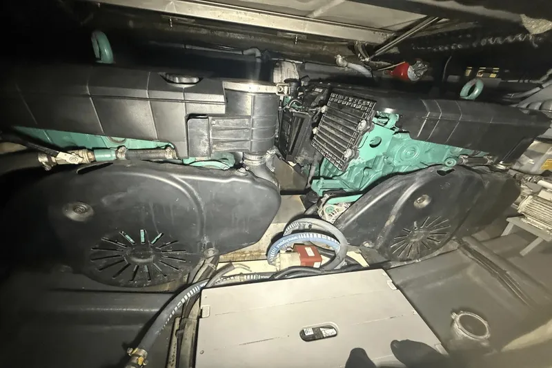 Slide: The Image of Engine compartment of a 2016 Cranchi M 44 HT yacht, showcasing mechanical components. - 52