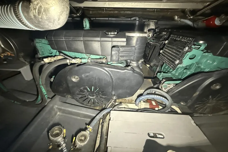 Slide: The Image of Engine compartment of a 2016 Cranchi M 44 HT yacht, showcasing mechanical components. - 54