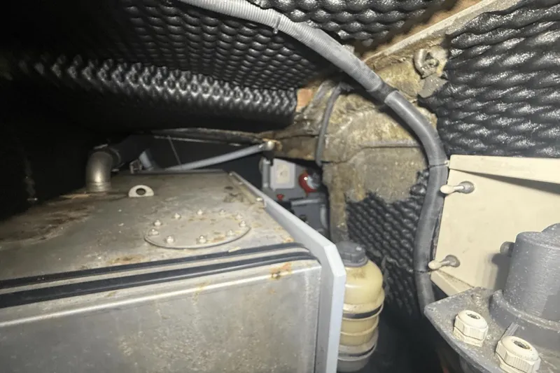 Slide: The Image of Engine compartment of 2016 Cranchi M 44 HT yacht, showing mechanical components and wiring. - 55