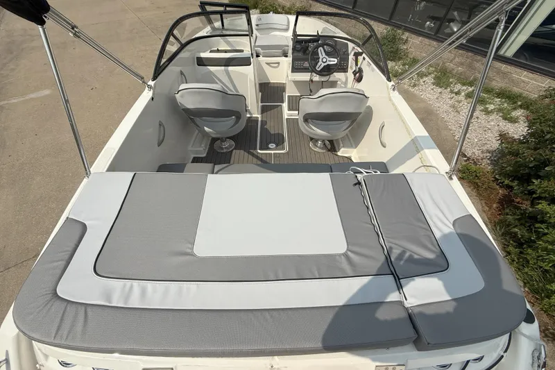 Slide: The Image of 2022 Bayliner VR4 Bowrider I/O interior with seating and steering wheel, viewed from above. - 5