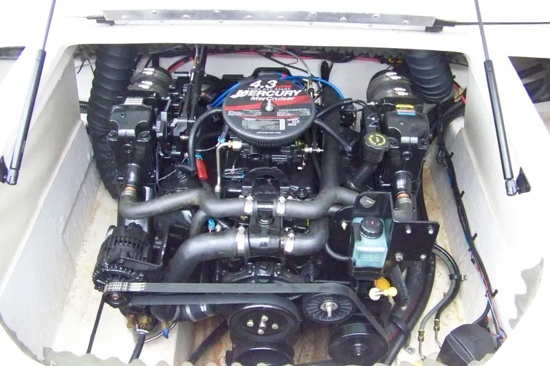 Slide: The Image of 2005 Tahoe Q4 I/O boat engine, featuring a 4.3 Mercury motor. - 6